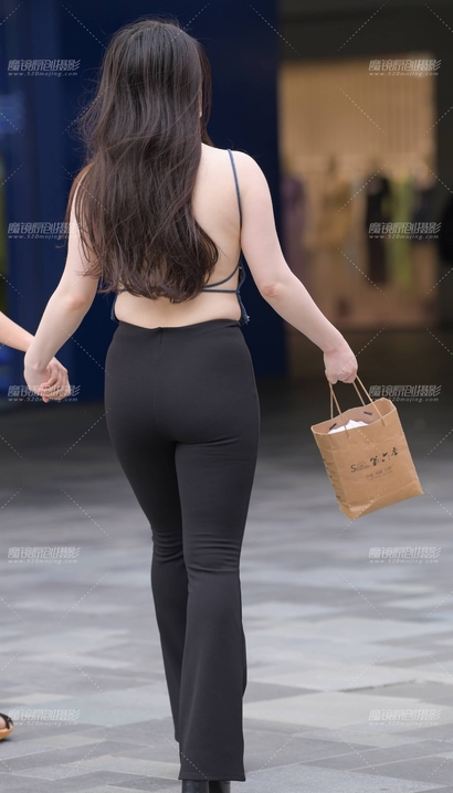 街拍面若桃花的时髦紧身裤圆臀靓女[DV-E340]